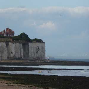 Cliffside beach boat wind farm in Broadstairs