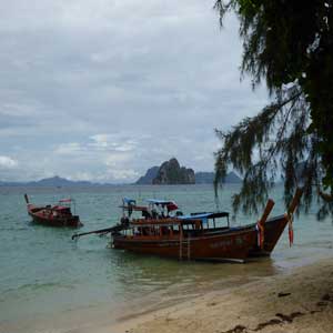 Longtail boats docked off Ko Ngai